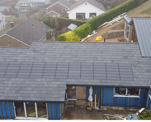 0010_Solar Tiles Installed On This Roof With The Nulok System Along With Natural Slate