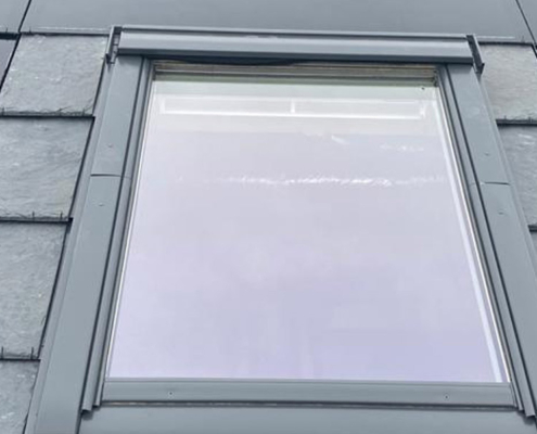 0014_Solar Tiles Installed Around A Velux