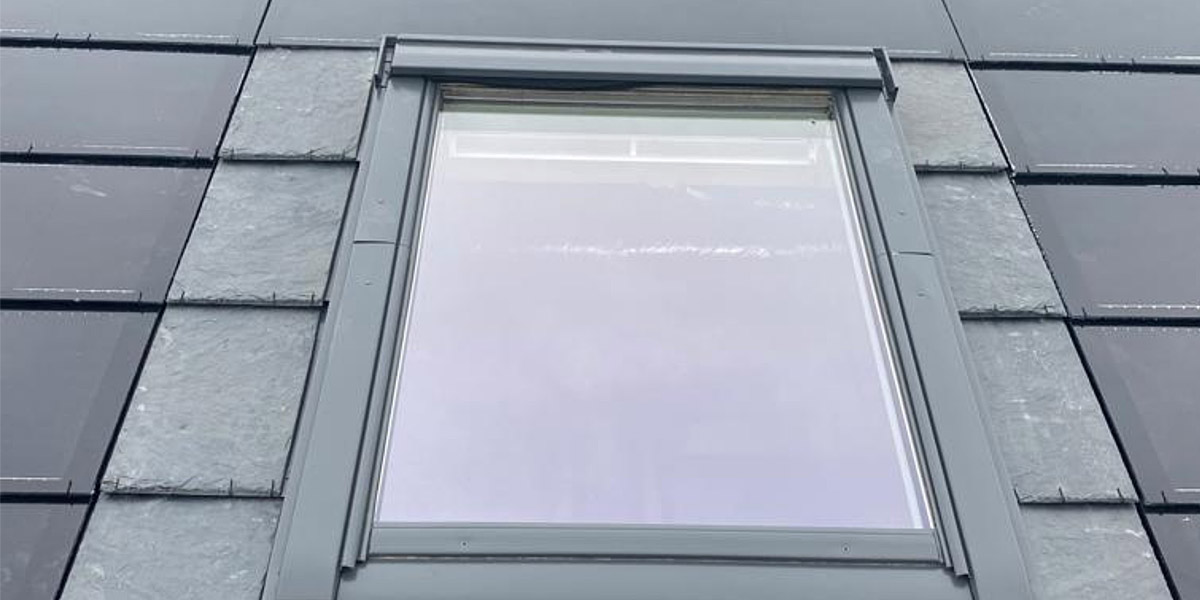 0014_Solar Tiles Installed Around A Velux