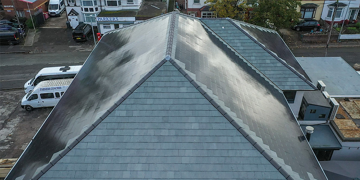 0016_Side view of Nulok Solar Tile Roof Installation On Pub In Ellesmere Port