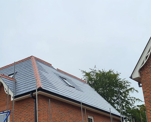 0021_Nulok Solar Tiles Installed With Spanish Slate On This Development In A Conservation Area Side View