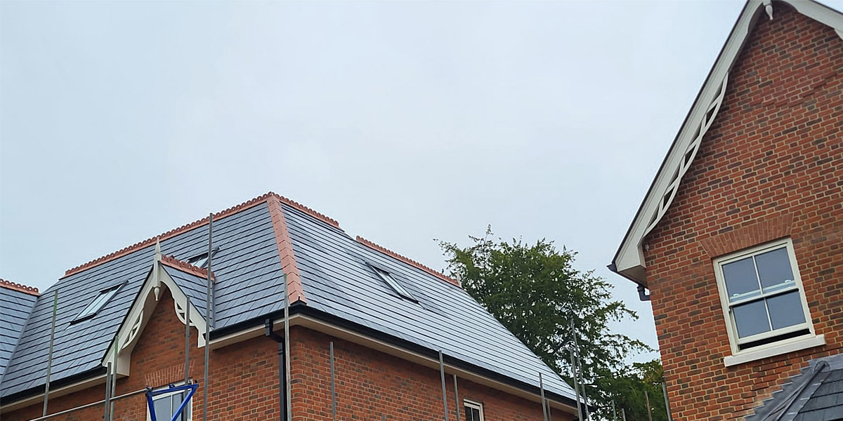 0021_Nulok Solar Tiles Installed With Spanish Slate On This Development In A Conservation Area Side View