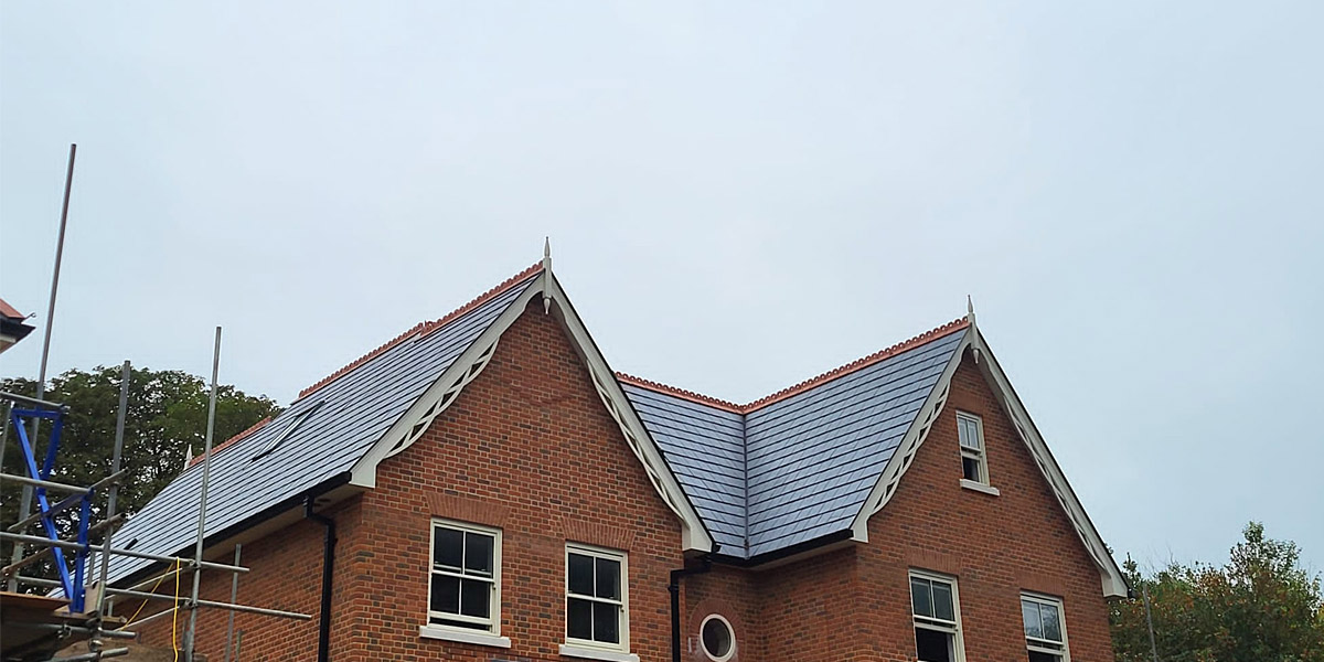 0022_Nulok Solar Tiles Installed With Spanish Slate On This Development In A Conservation Area Front Side View