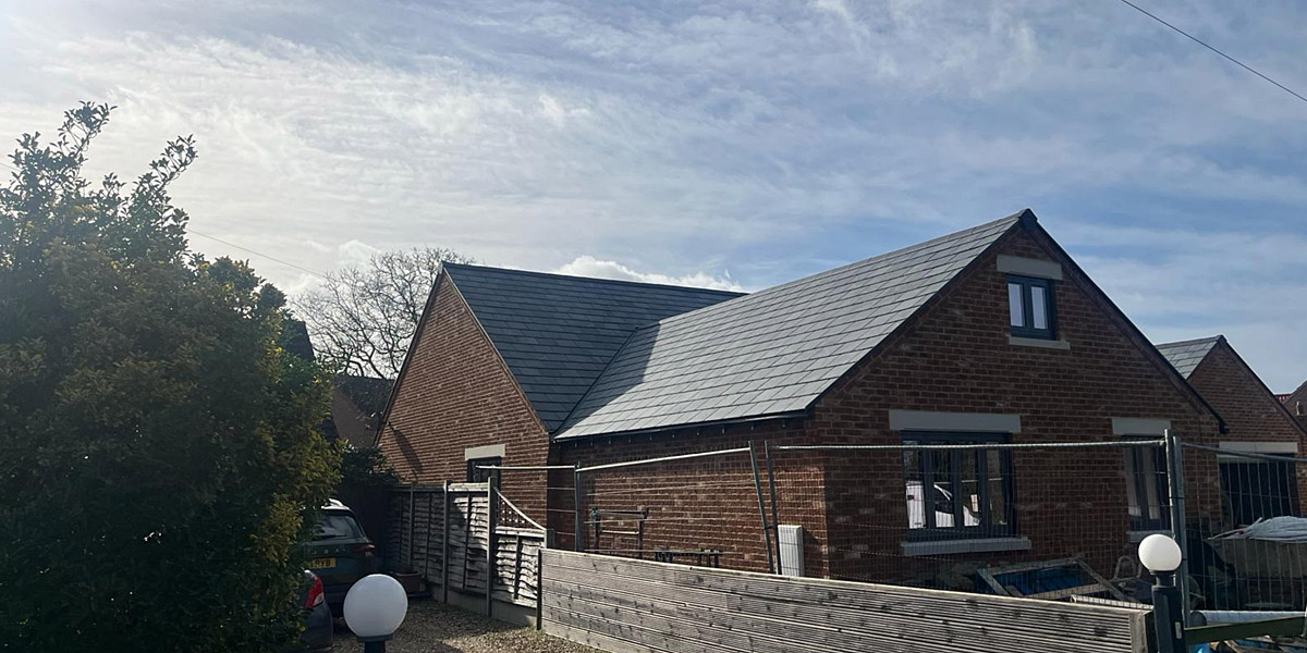 0067_Brazilian Slate Installed On The Nulok System On New Roof In England. This Is The Side View