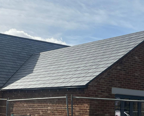0068_Brazilian Slate Installed On The Nulok System On New Roof In England. This Is A Close Up Of The Side View